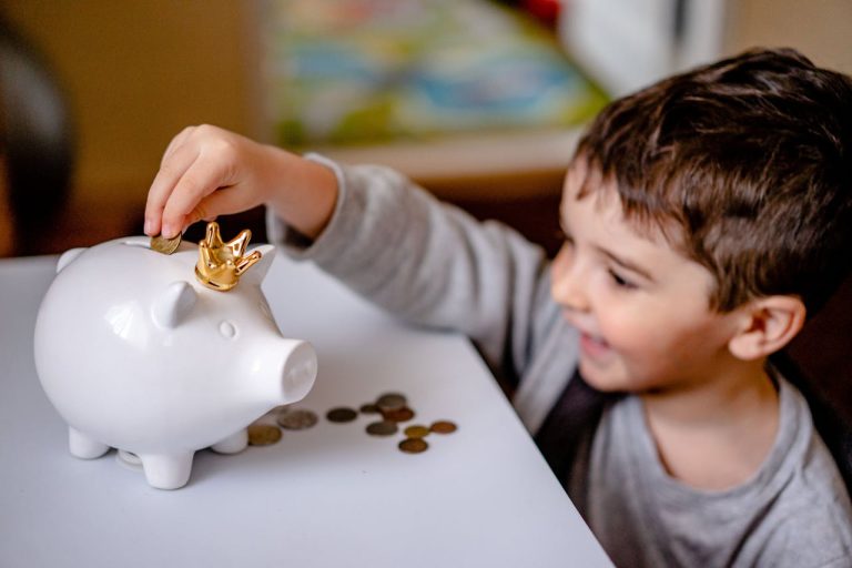 child with piggy bank