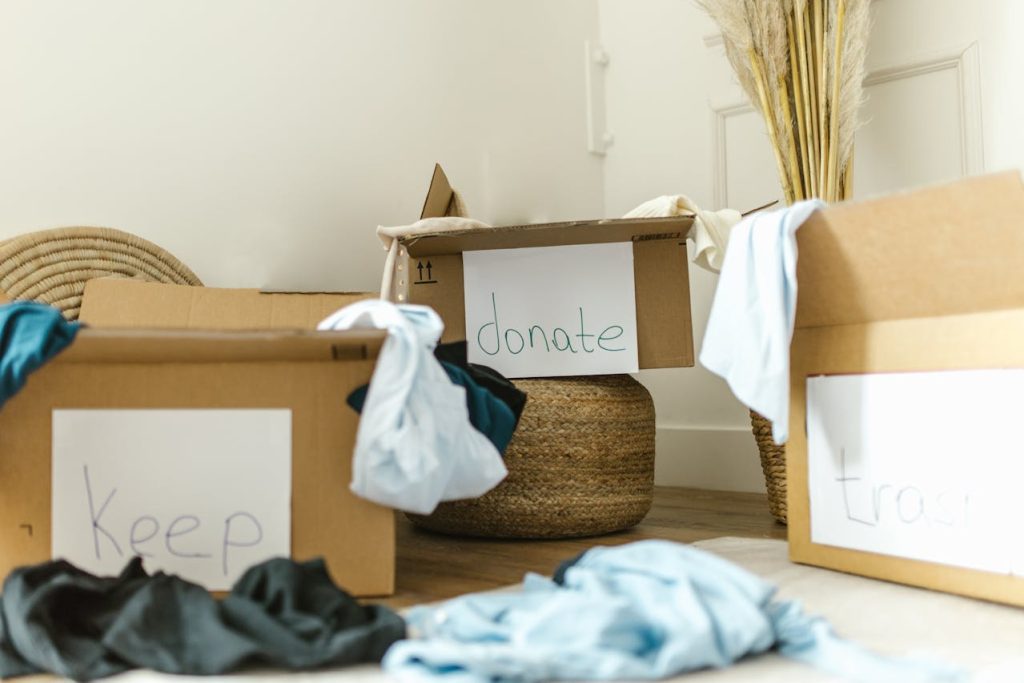 Get organized by first sorting your clutter with separate boxes